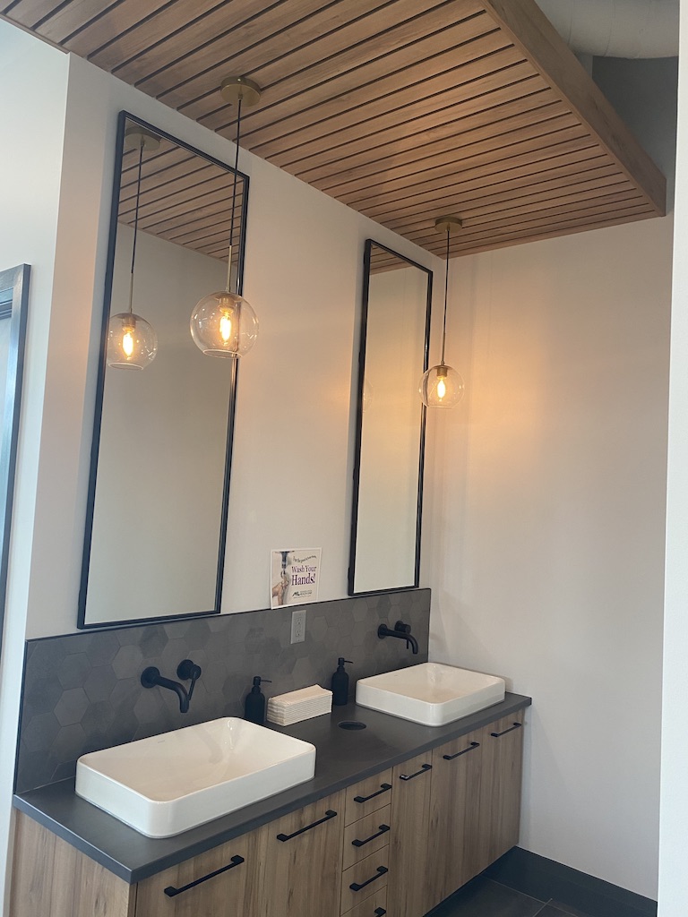 Modern vanity with pendent lighting